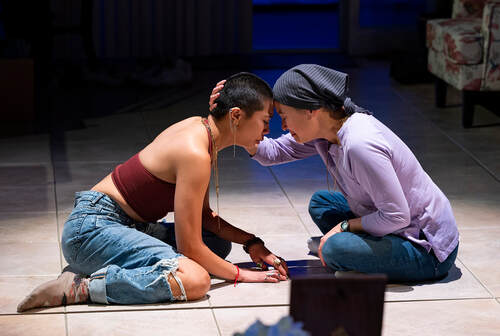 Francesca Fernandez McKenzie and Jennifer Lim in Steppenwolf Theatre Company’s world premiere of Bald Sisters by Vichet Chum, directed by Jesca Prudencio, running now through January 15, 2023. Photo by Michael Brosilow.